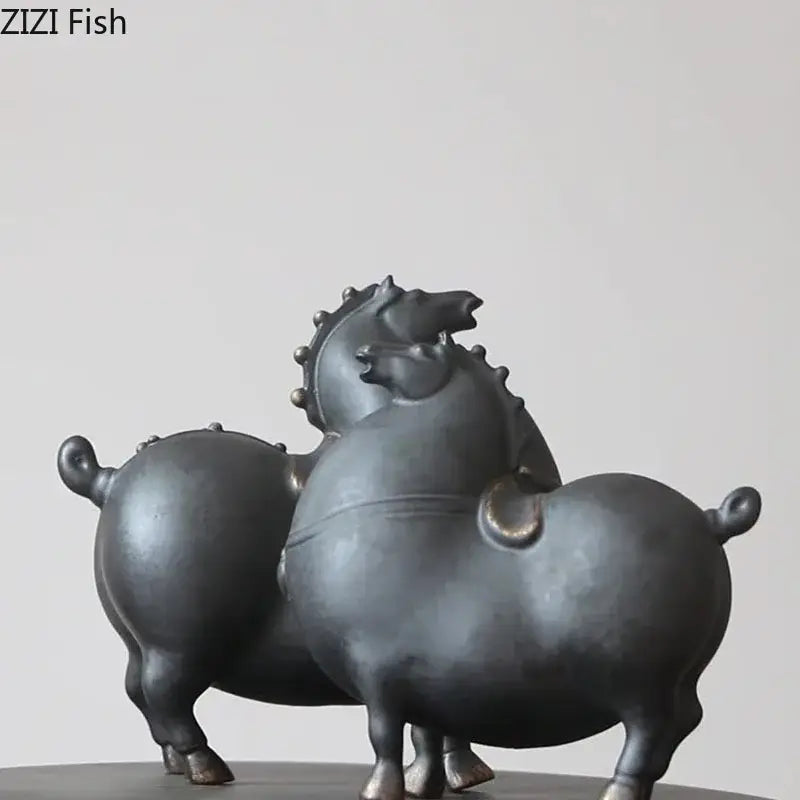 Dark gray horse porcelain statue featuring two stylized rounded ceramic horses with metallic accents for living room decor