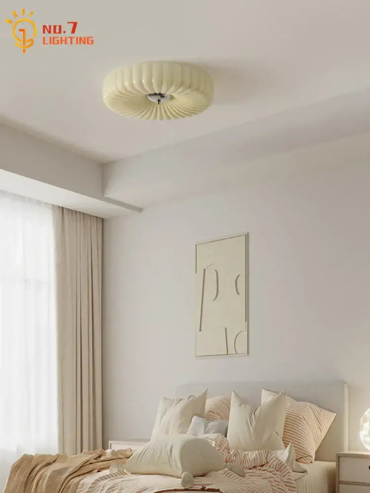Cream-colored ribbed ceiling light fixture featuring vintage decorbites cream glass wind design for bedroom use