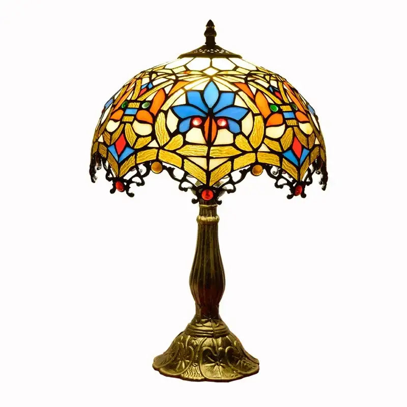Vintage dragonfly tiffany stained glass table lamp with blue orange yellow floral shade and ornate brass base for desk use