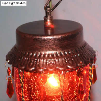 DecorBites™ conical red yellow blue glass pendant light featuring a copper-toned embossed metal jar and amber crystals