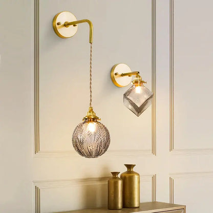 Gold-finished wall lamp with vintage etched grey glass led shade hanging from twisted cord for decorbites grey glass sconce