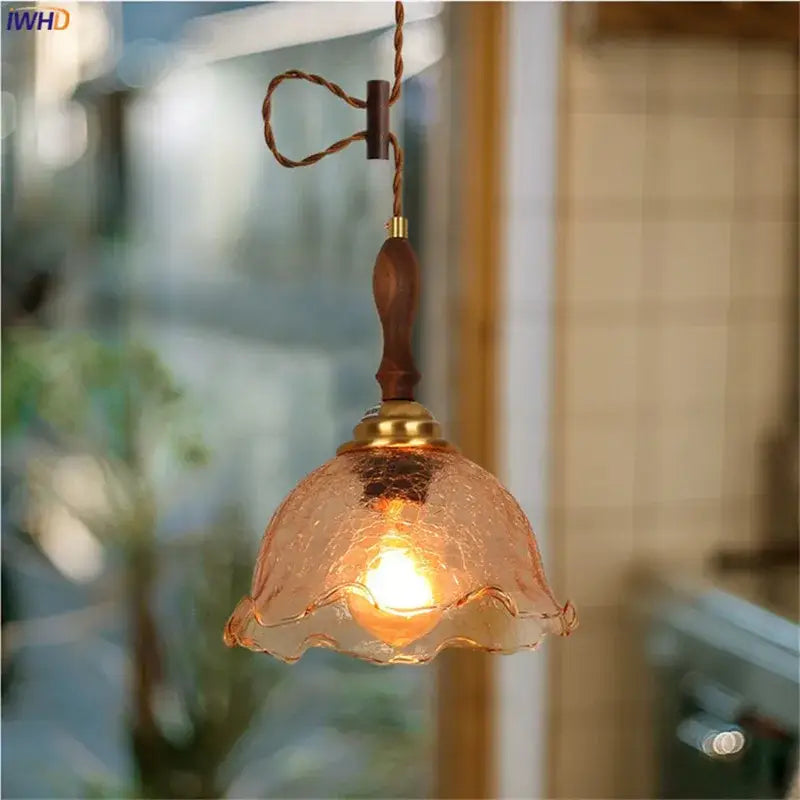 Vintage floral cracked glass pendant light featuring warm amber textured glass with dark wood handle for living room decorbites cracked glass