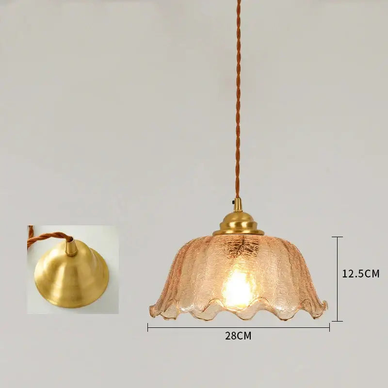 A warm-toned vintage floral cracked glass pendant light with brass fixture and twisted cord for living room decorbites cracked glass