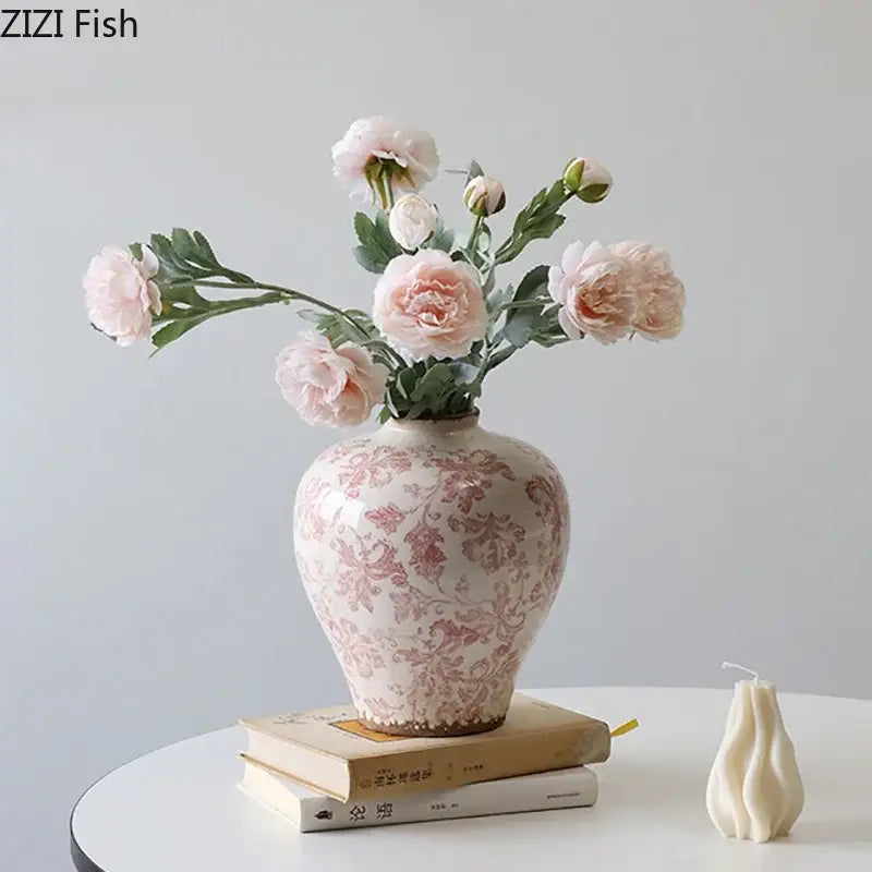 A delicate porcelain vase with cracked texture blue design holding light pink peonies for living room decorbites decor