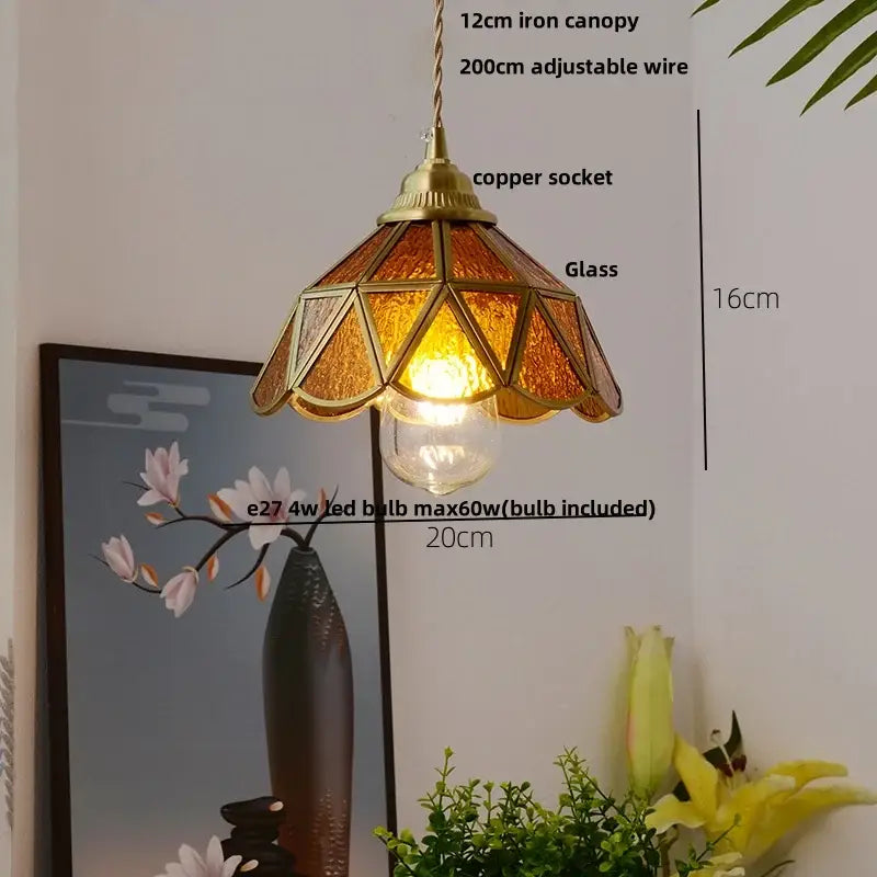 Vintage floral stained glass pendant lamp with warm amber geometric panels copper wire glass and brass canopy decorbites copper wire
