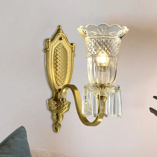 Gold-toned vintage floral wall light with crystal glass shade and dangling prisms for elegant wall lamp decor