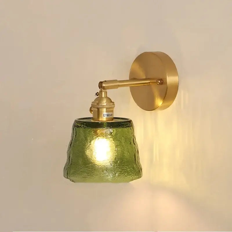 Vintage floral green glass led wall lights featuring a textured olive green glass led wall sconce with brass finish