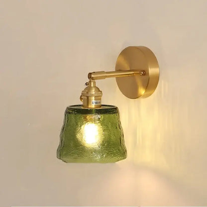 Vintage floral green glass led wall lights featuring a textured olive green glass led wall sconce with brass finish