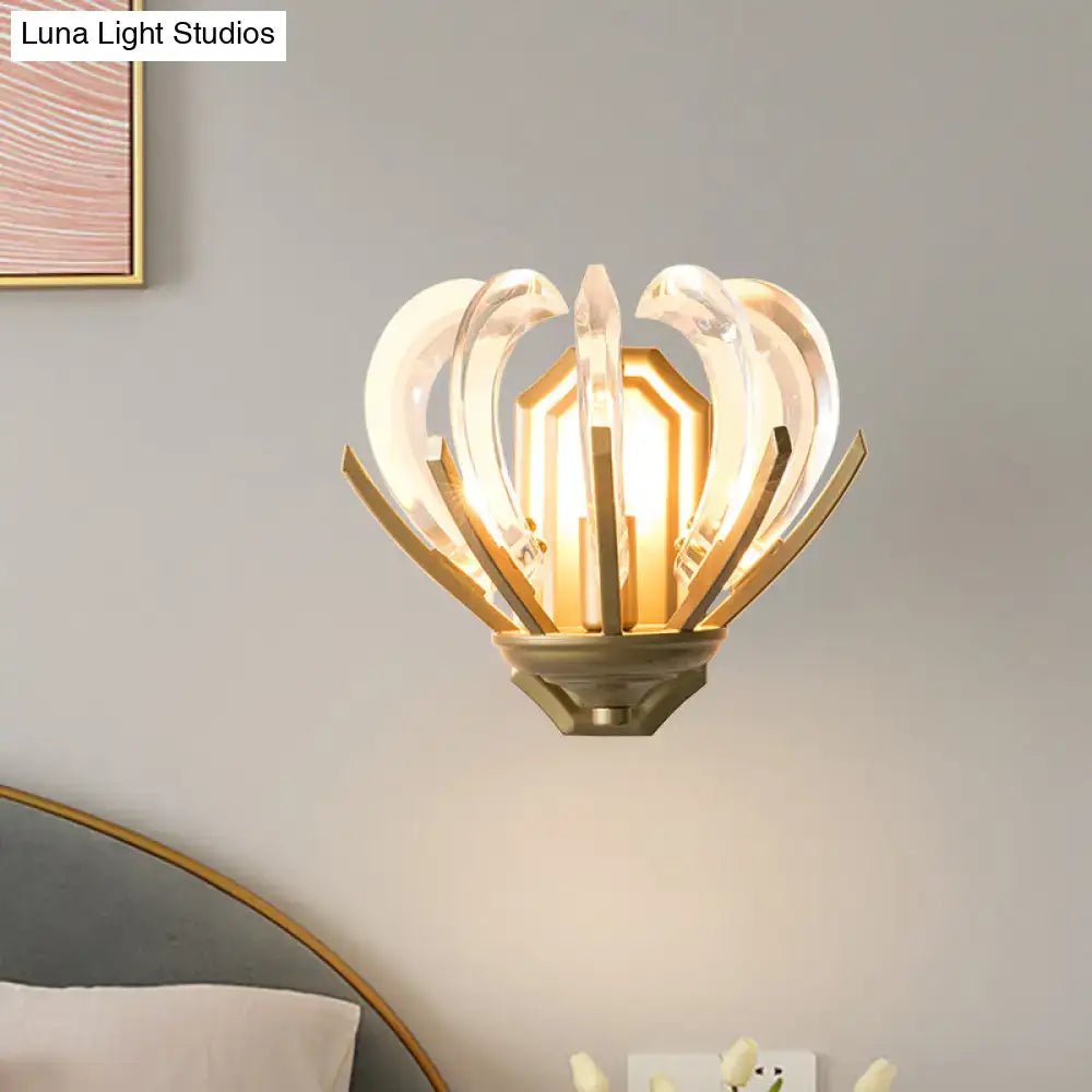 Gold finish wall light featuring vintage flower design and clear petal-shaped crystal accents for bedroom use