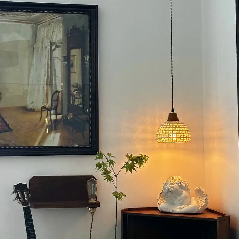 Vintage fluted off-white ceramic led pendant bedroom hanging light paired with a white ceramic angel on dark wood shelf decorbites ceramic led