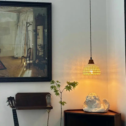 Vintage fluted off-white ceramic led pendant bedroom hanging light paired with a white ceramic angel on dark wood shelf decorbites ceramic led
