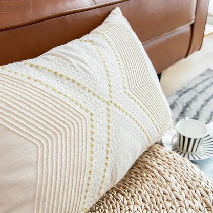 Cream-colored cushion cover with subtle gold thread embroidery and geometric ivory vintage decorbites design