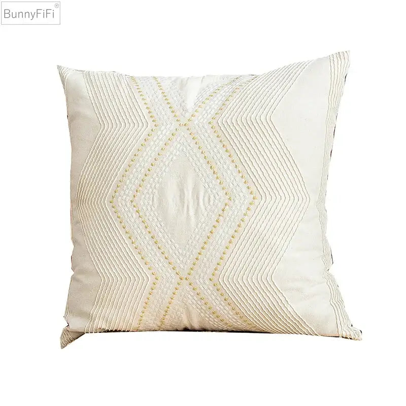 Cream-colored cushion cover with intricate gold-threaded geometric ivory vintage embroidery for living room decorbites