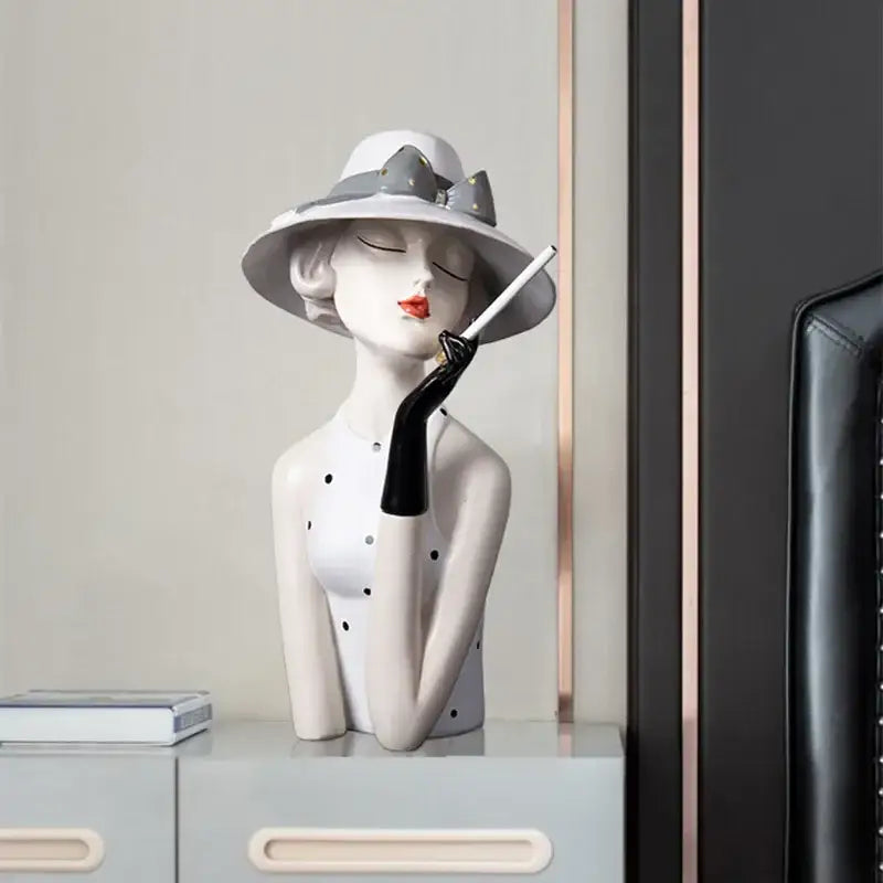 A sleek white ceramic vintage glamour resin bust woman in gray fedora with polka dot top for decorbites elegant living room decor