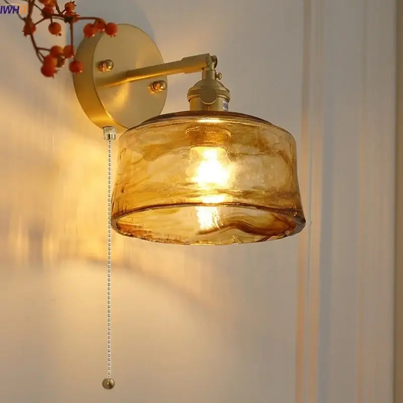 Vintage gold and amber glass led wall light featuring a gold-toned sconce with decorbites amber vintage textured shade