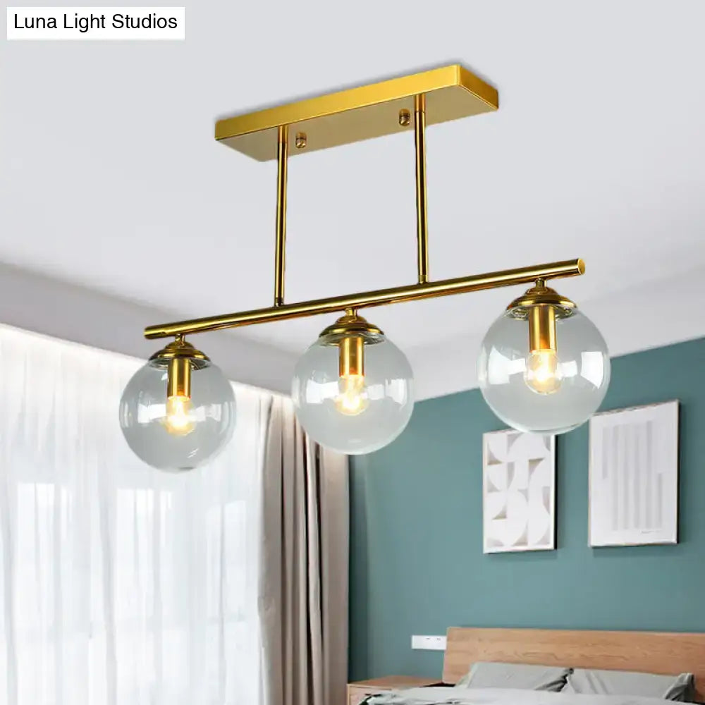 Decorbites™ vintage 3-bulb glass pendant lamp with gold fixture and clear amber glass sphere shades for island lighting