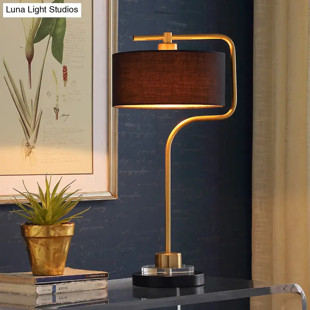 DecorBites™ vintage black table lamp with gold metal frame, drum shade, and clear bulb base for living room use