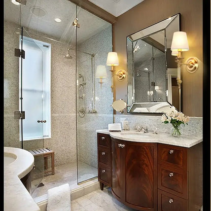 Dark wood vanity with marble countertop and silver hardware paired with vintage gold and cream led wall sconce decorbites copper vintage