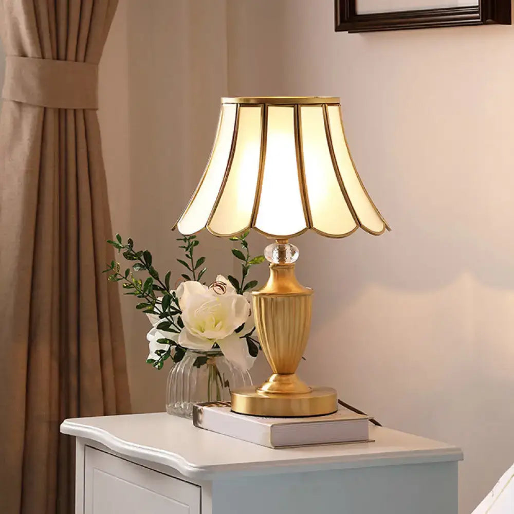 Gold-toned table lamp with fluted cream fabric shade and crystal base accent for elegant 220v-240v living room lighting