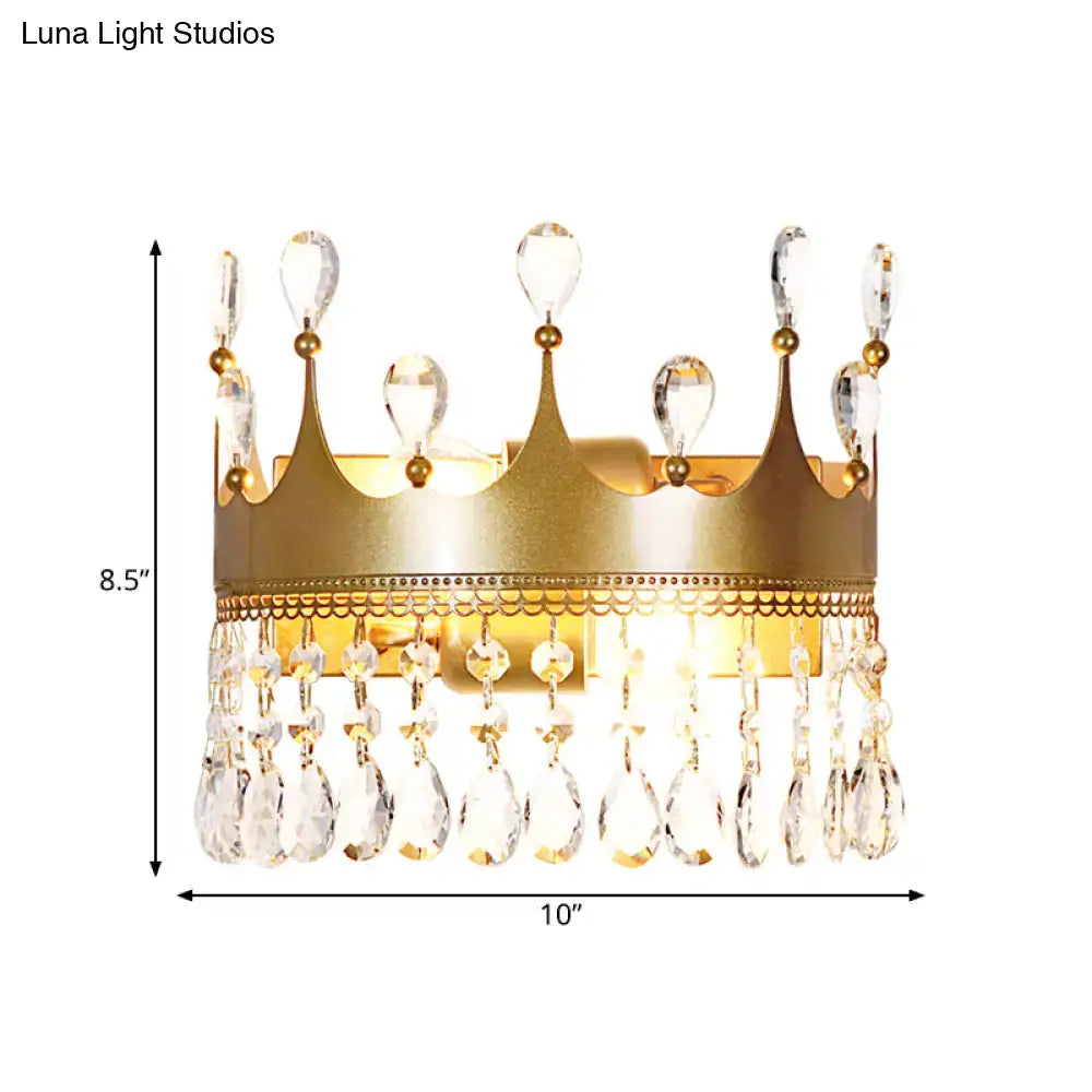 Vintage gold crown-shaped wall lamp adorned with clear crystal teardrops and decorative beads for bedroom use