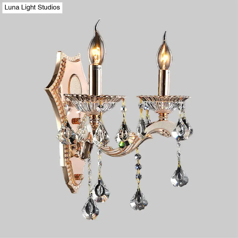 Vintage gold crystal sconce light fixture with gold-toned crystals and two candle-style bulbs direct wired electric