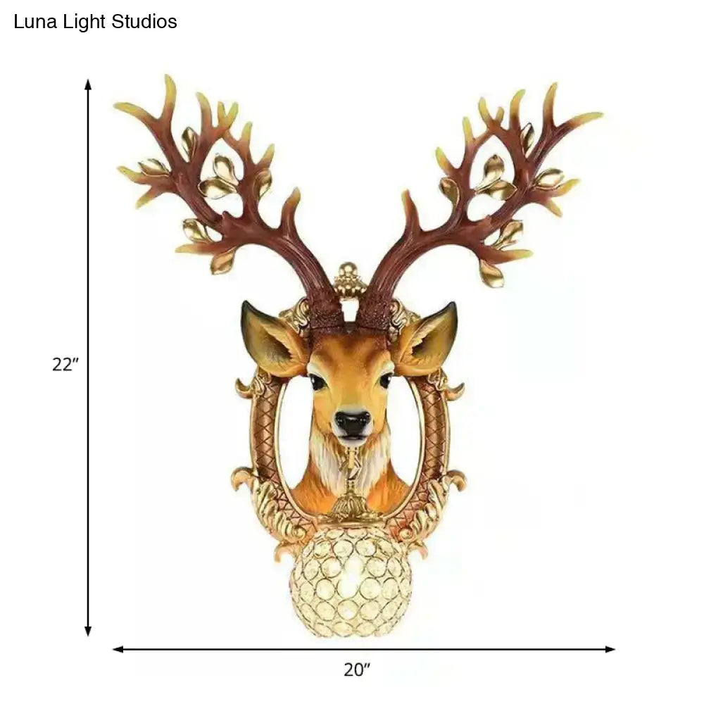 Vintage gold deer backplate crystal wall sconce with e26 e27 light featuring detailed deer head and illuminated globe base