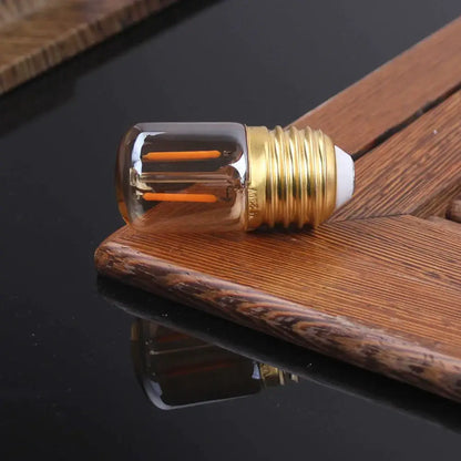 Vintage gold dimmable led tubular bulb with clear glass and orange filaments for bedroom lighting 6 pack