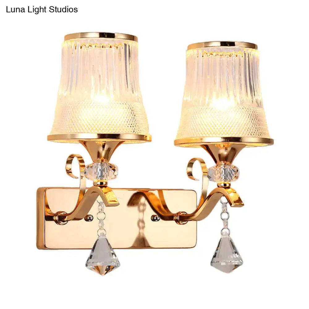 Vintage gold finish wall lamp with clear glass fluted shades and crystal pendants for bedroom lighting