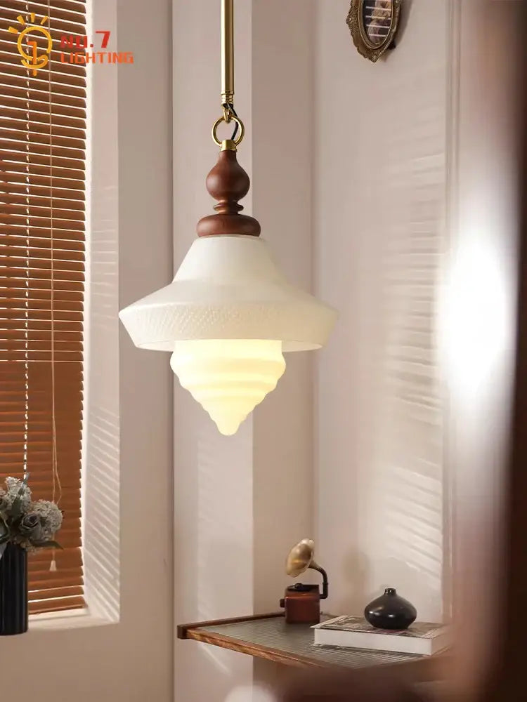 Vintage-style pendant lights with warm frosted gold lustre glass and polished brass fixture for kitchen island decorbites gold lustre