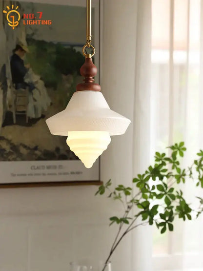 Vintage-style pendant light with white textured gold lustre glass shade and brass frame for kitchen island decorbites gold lustre