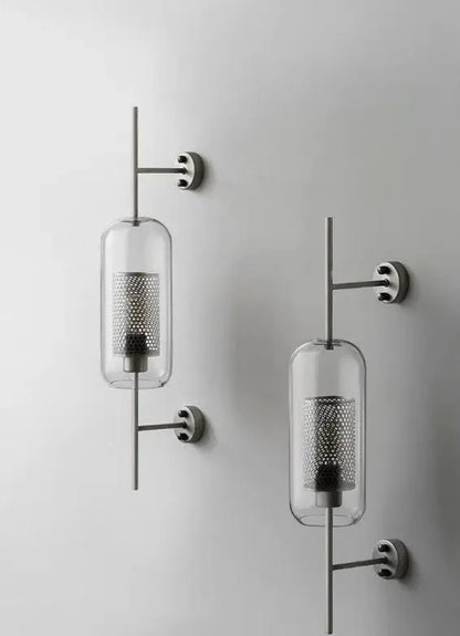 Modern minimalist wall sconce with clear glass cylinders and chrome arms for decorbites led wall bedroom lighting fixture