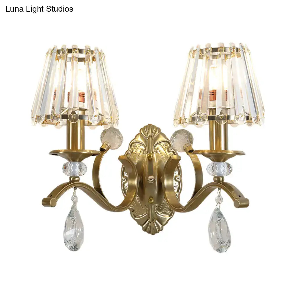 Vintage gold metallic wall lamp with brass finish crystal chandelier shades and dangling teardrop crystals for bedroom use