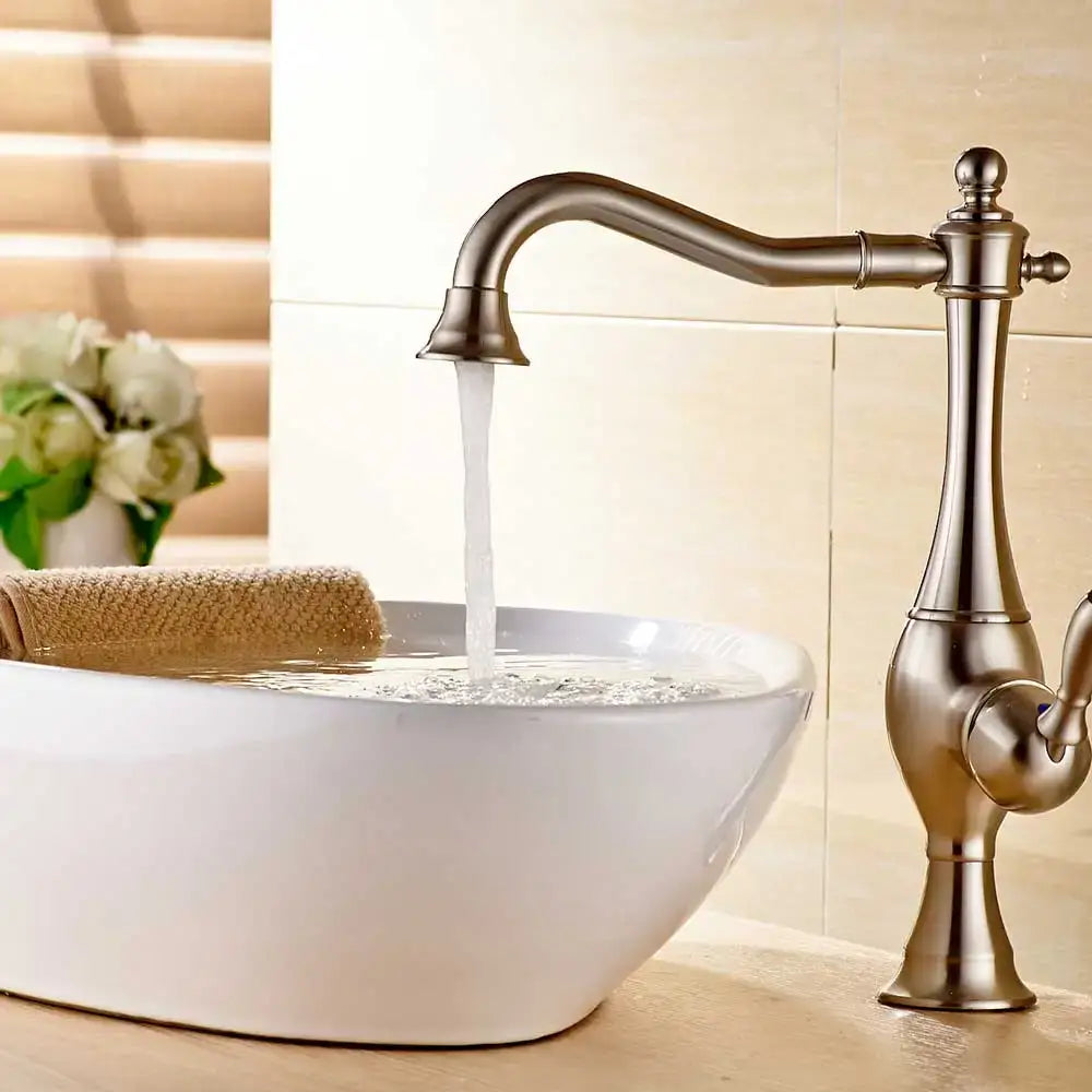 Vintage gold single handle basin faucet with antique brass finish and ornate detailing by decorbites golden basin