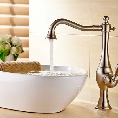 Vintage gold single handle basin faucet with antique brass finish and ornate detailing by decorbites golden basin