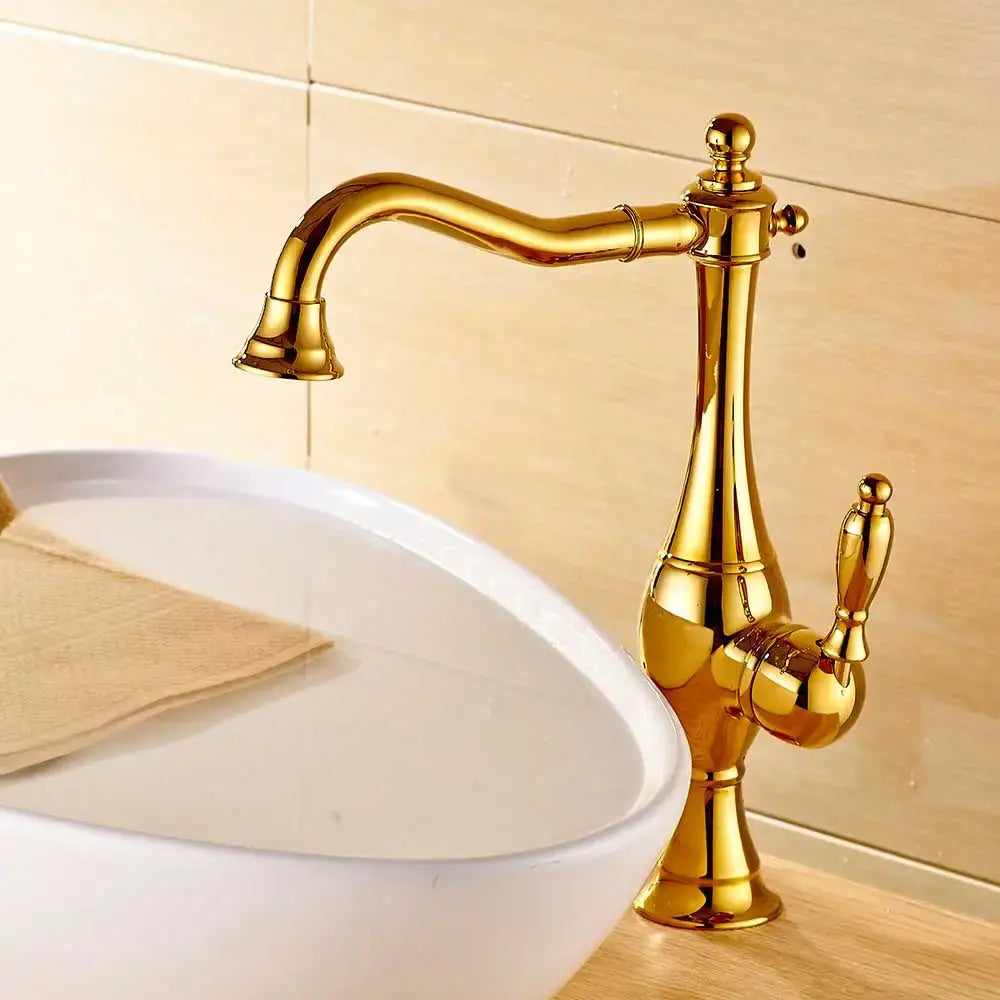 Vintage gold single handle basin faucet in brass finish with ornate detailing and curved spout decorbites golden basin