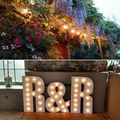 Illuminated r&r letter signs with warm glowing gold tint g40 led filament lights for vintage bedroom decorbites gold tint