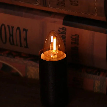Warm-toned vintage gold tint glass led candelabra bulb in sleek black holder ideal for dining room decorbites gold tint