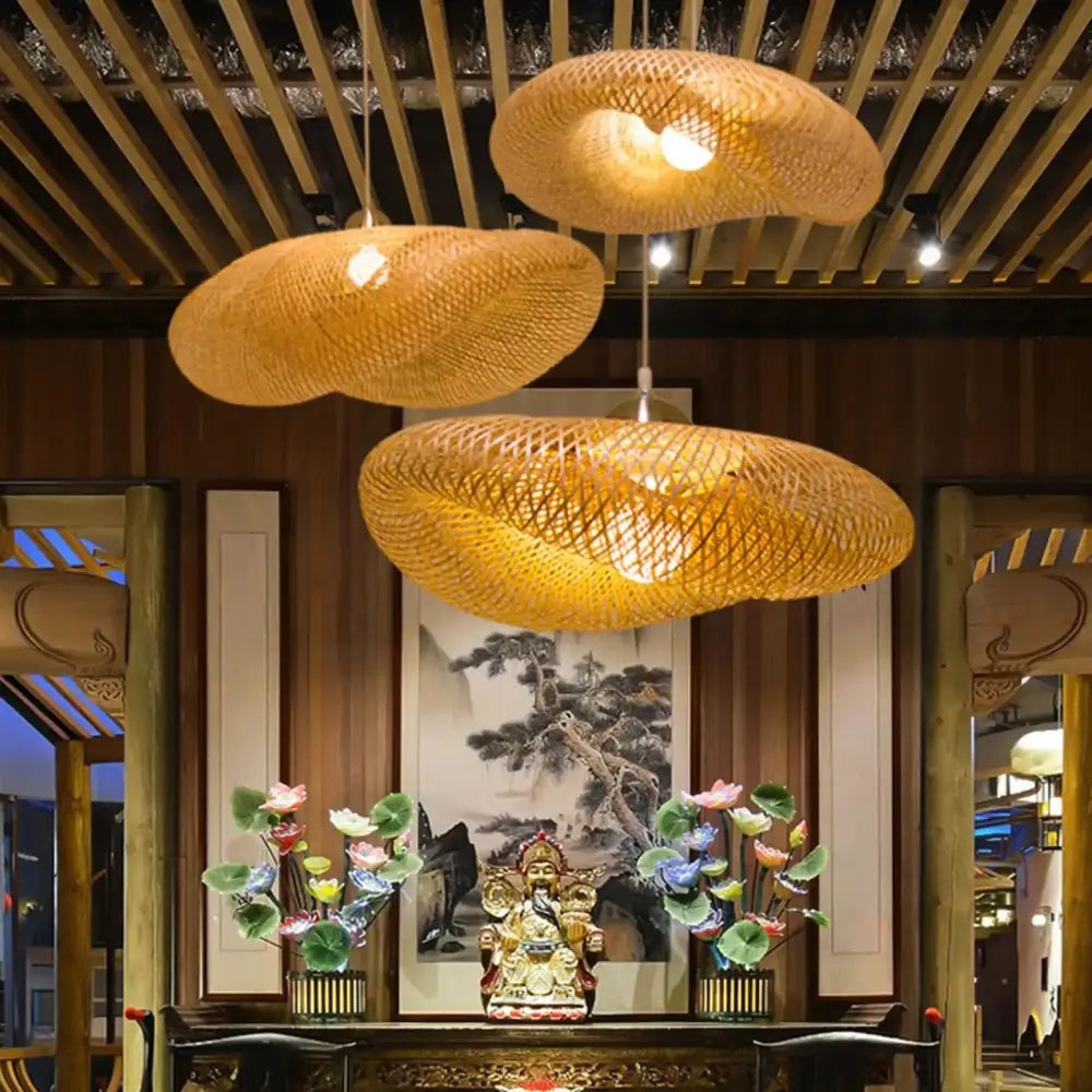 Three warm-toned vintage golden bamboo weave led pendant lights for dining room in modern rustic style