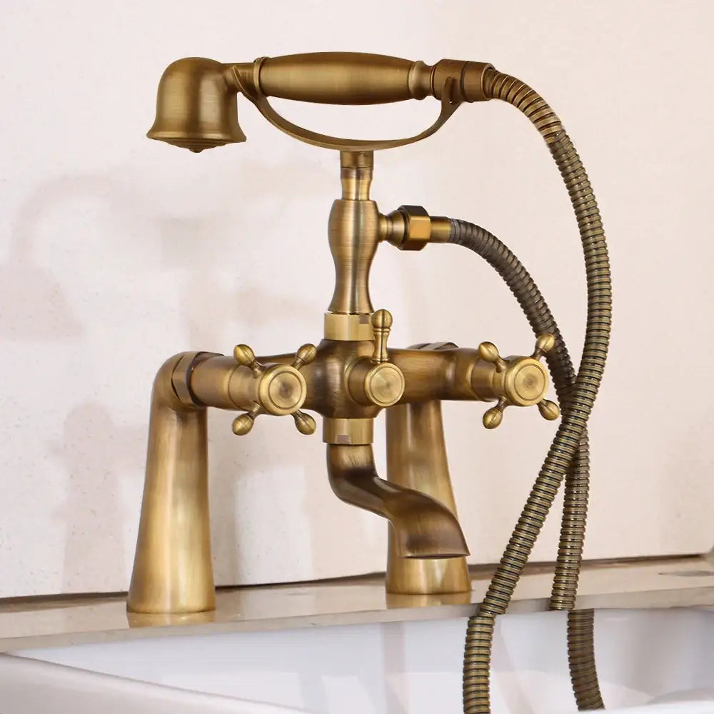 Antique brass decorbites golden bathtub faucet with three ornate handles and floral handshower for bathroom decor