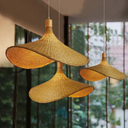 Handwoven golden brown bamboo chandeliers led pendant lights with natural textured weave and wooden fixtures for dining room decorbites