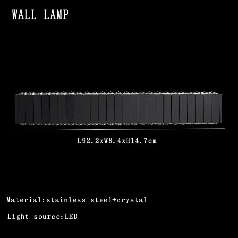 Modern black wall lamp with stainless steel and crystal accents shown alongside vintage gray glass large ceiling pendant light