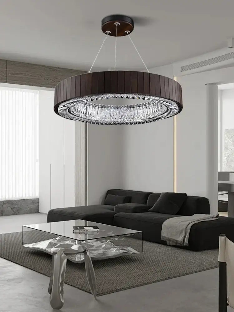 Dark wood ring chandelier pendant light with crystal accents and gray glass large ceiling mount for stairwell lobby