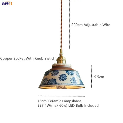 A vintage green ceramic pendant light with an 18cm blue and white floral ceramic lampshade suspended by copper wire