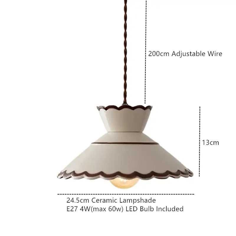 Cream-colored ceramic pendant light with scalloped edge and dark trim featuring 200cm adjustable twisted wire suspension