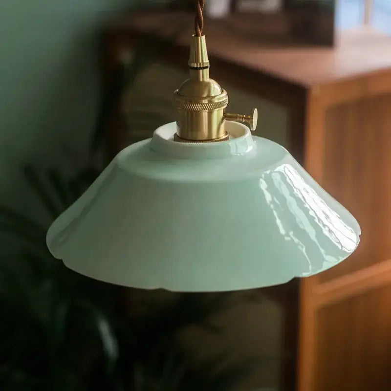 Delicate mint green ceramic pendant light with brass socket and cord for vintage kitchen hanging illumination