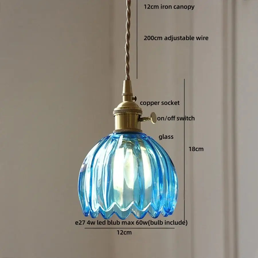 Translucent blue glass pendant light with fluted scalloped design and brass hardware for vintage led pendant light use