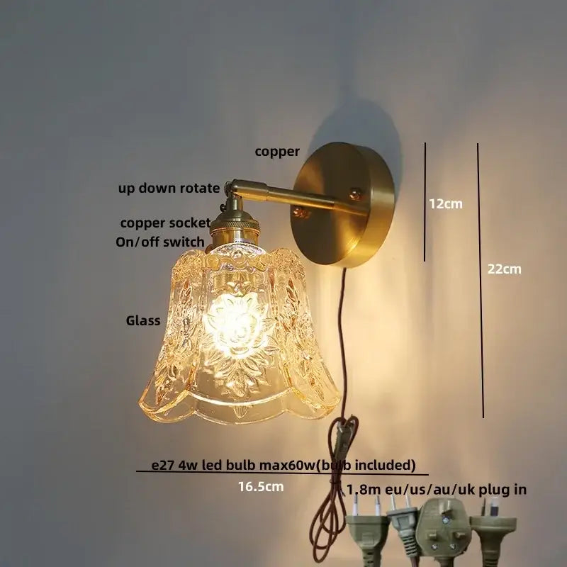 Vintage wall lights with green glass led sconce featuring a copper arm and ornate floral etched glass shade for bedroom use