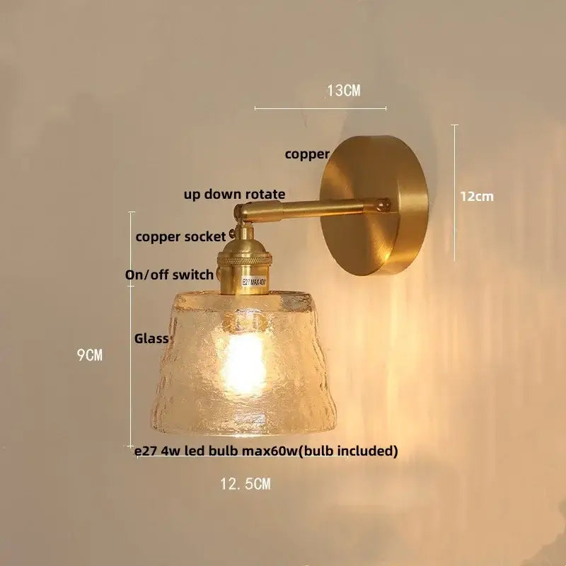 Vintage green glass led wall lights featuring a warm-toned brass sconce with textured frosted glass and adjustable arm