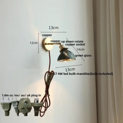 Copper wall sconce with green glass led shade and adjustable brass arm for bedroom or stair lighting