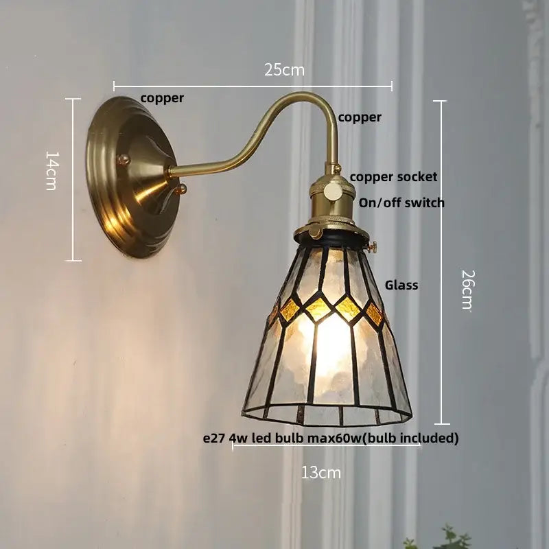 Vintage brass wall sconce with stained glass led shade featuring green glass led and amber geometric patterns